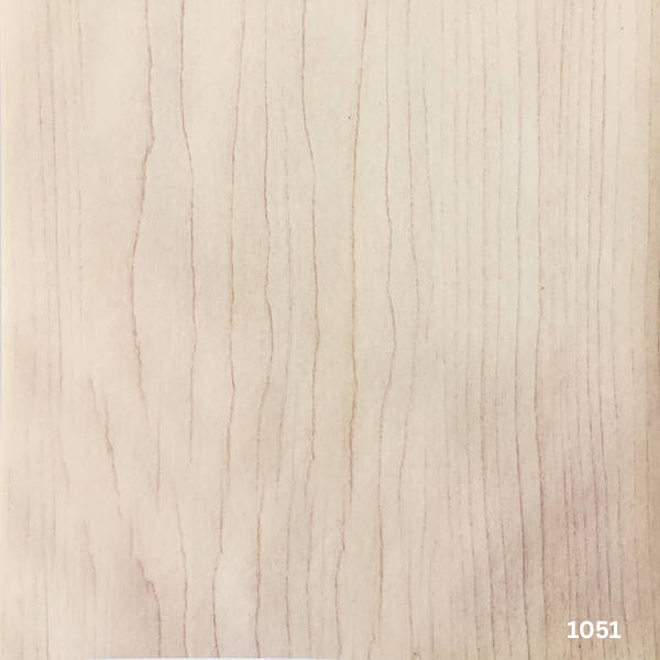 Close-up of a light wood texture swatch with a visible grain pattern.